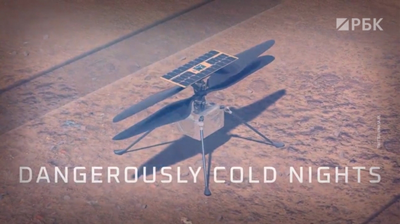 Марсоход готовится запустить вертолет и ставит метки на камнях. Видео