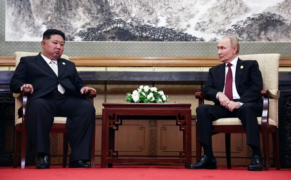 Путин рассказал, как перекинулся двумя-тремя словами с Алиевым