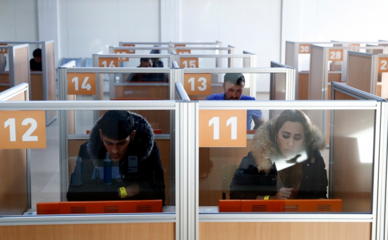 С России введут обязательную для работы электронную регистрацию мигран