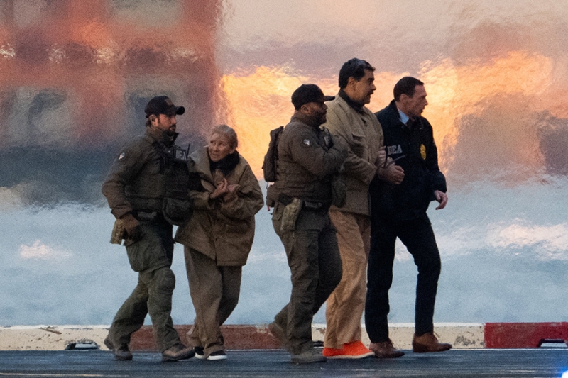 В наручниках и тюремной футболке: первый суд над Мадуро. Фоторепортаж